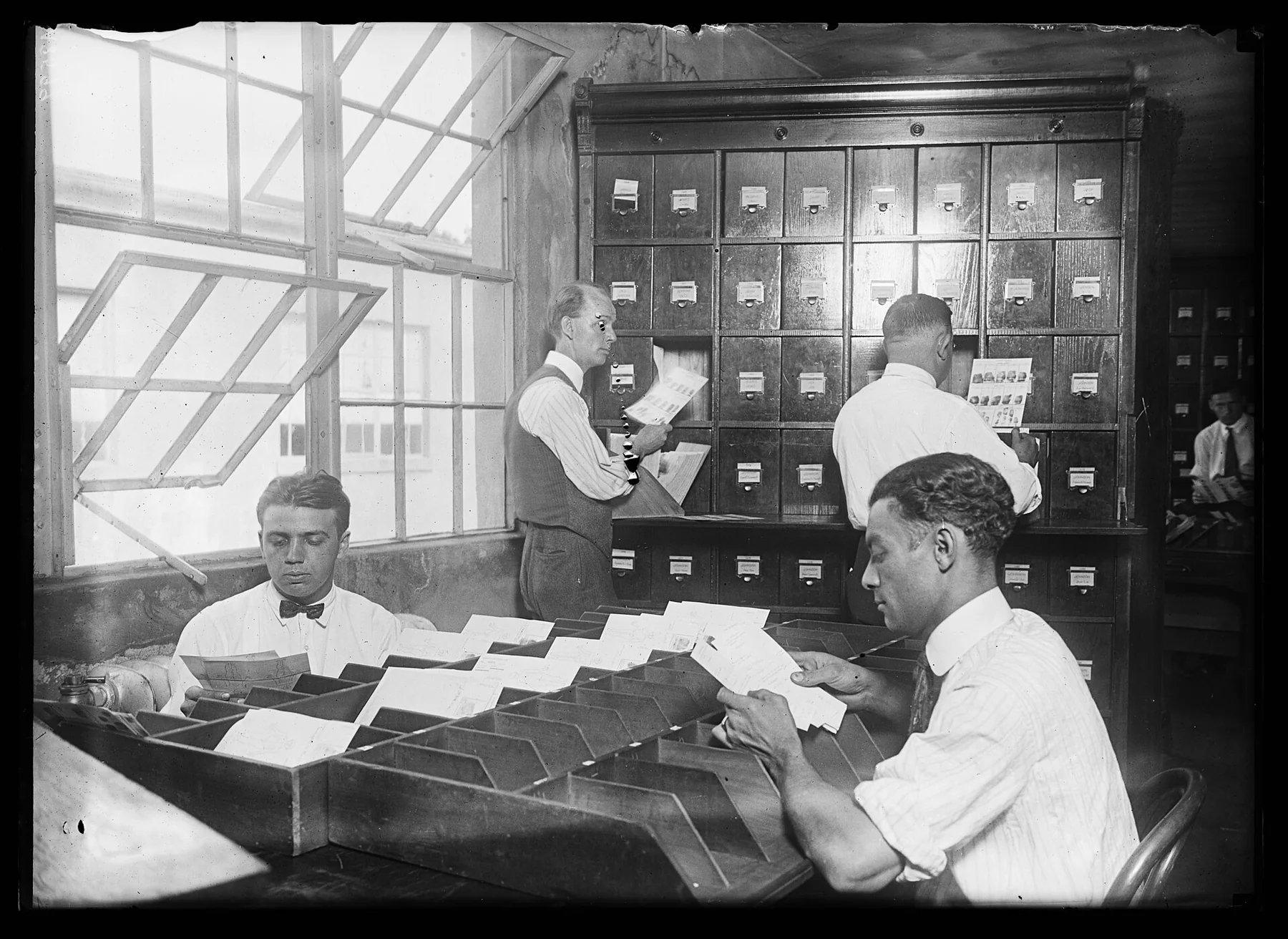 Finger Print Dept. shows students learning art of finger prints LCCN2016887384, an archival visual related to Why Do We Have Fingerprints.