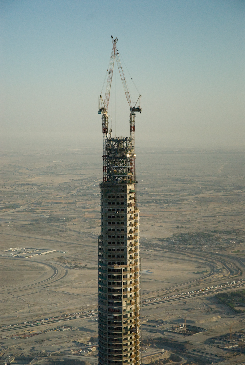 Aerial view of Burj Khalifa's tapering spire over Dubai.