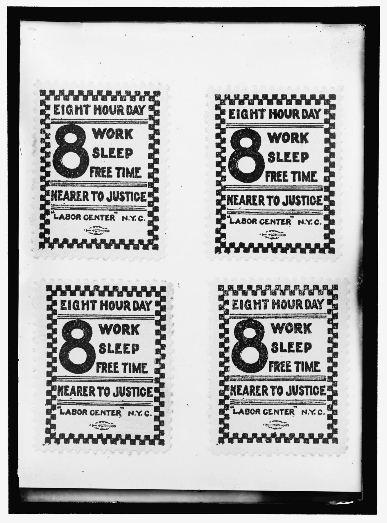 8 HOUR DAY SIGNS LOC hec.07566, an archival visual related to How Did the Eight-Hour Workday Begin.