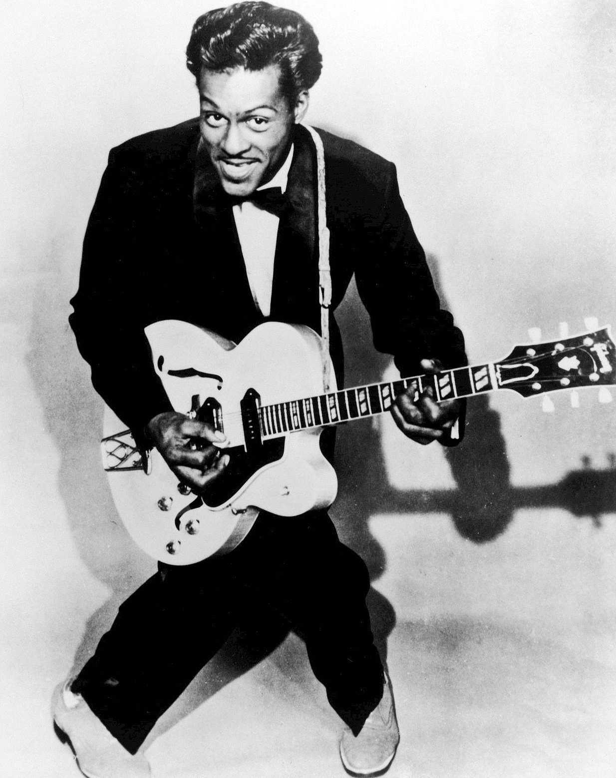 Publicity photograph of Chuck Berry with his guitar, 1957.
