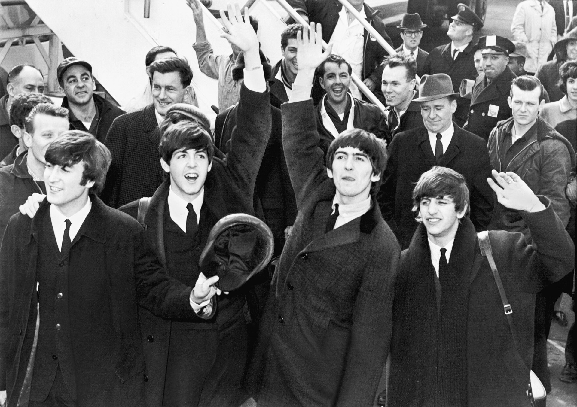 The Beatles arriving at John F. Kennedy International Airport in New York, 1964.