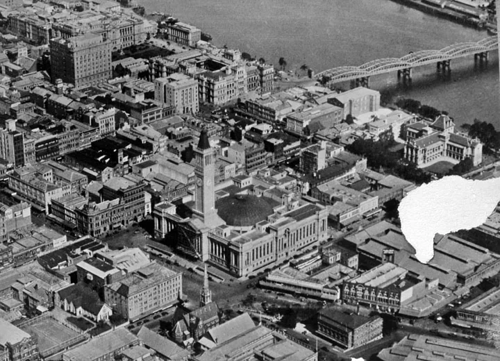 Queensland State Archives 2452 Aerial photograph of the city of Brisbane October 1930, an archival visual related to How Did Cities Become So Large.