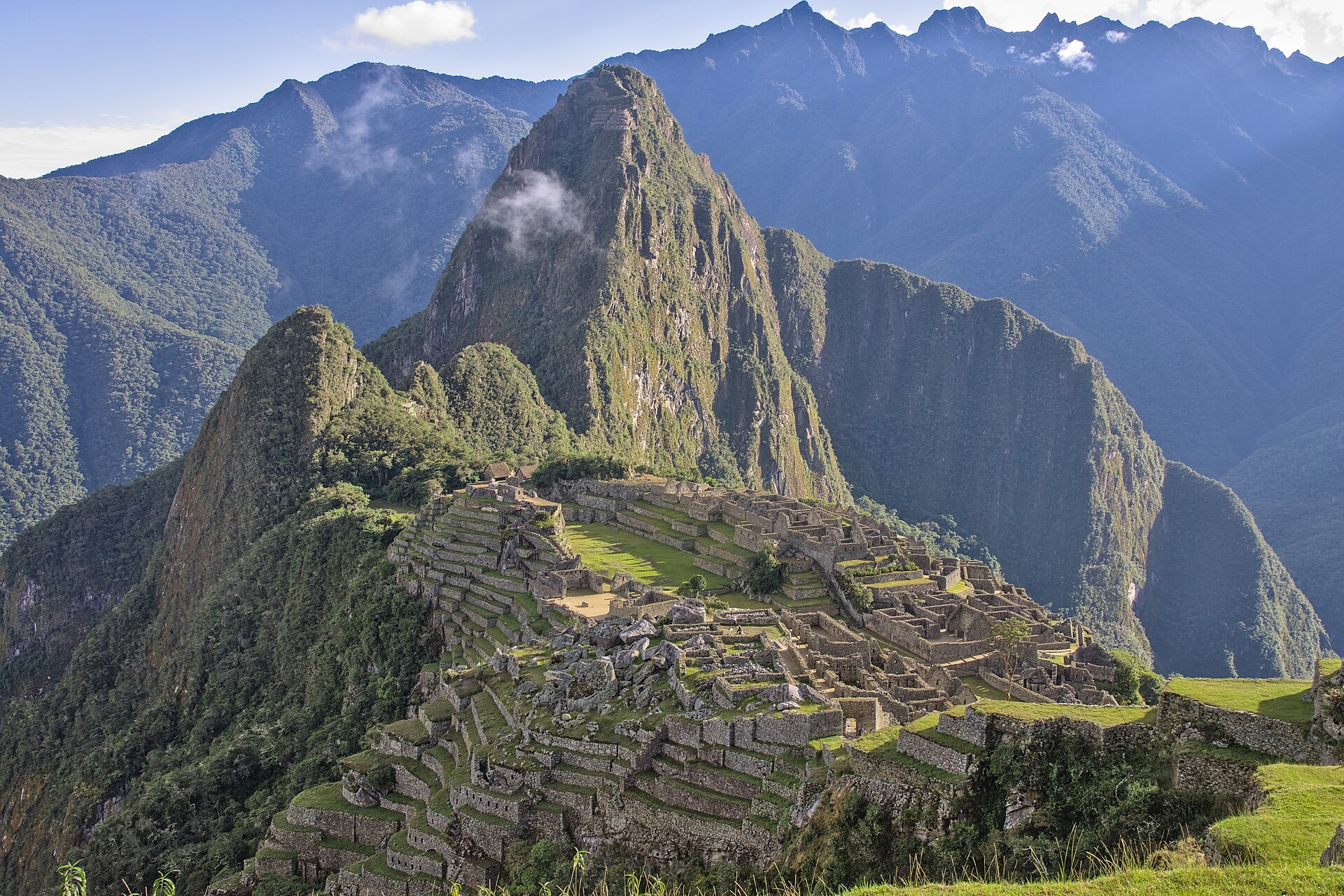 Terraced stone ruins of Machu Picchu among Andean peaks.