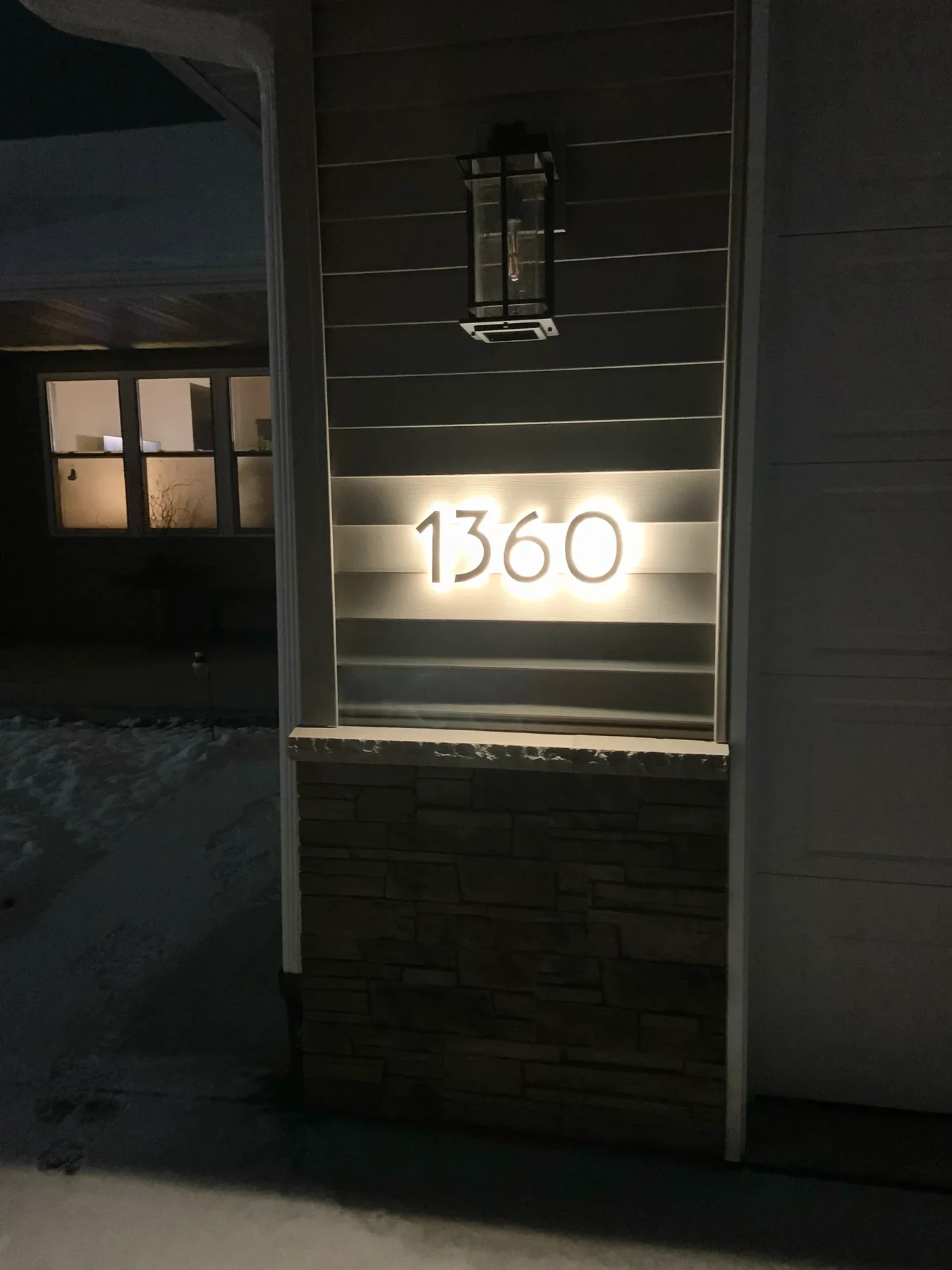 Lit up address, an archival visual related to Why Do We Have Street Addresses.