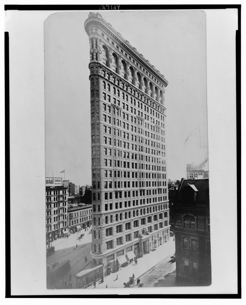 Historic view of the Flatiron Building rising over Manhattan.