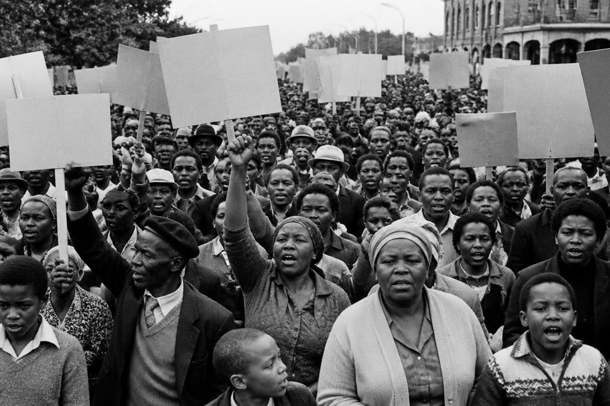 Original editorial illustration of an anti-apartheid demonstration in South Africa.